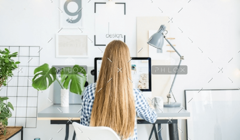 demo-attachment-928-happy-lady-sitting-in-office-coworking-while-P5AFND8
